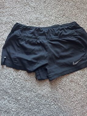 Nike Women's Black Athletic Shorts with Reflective Swoosh